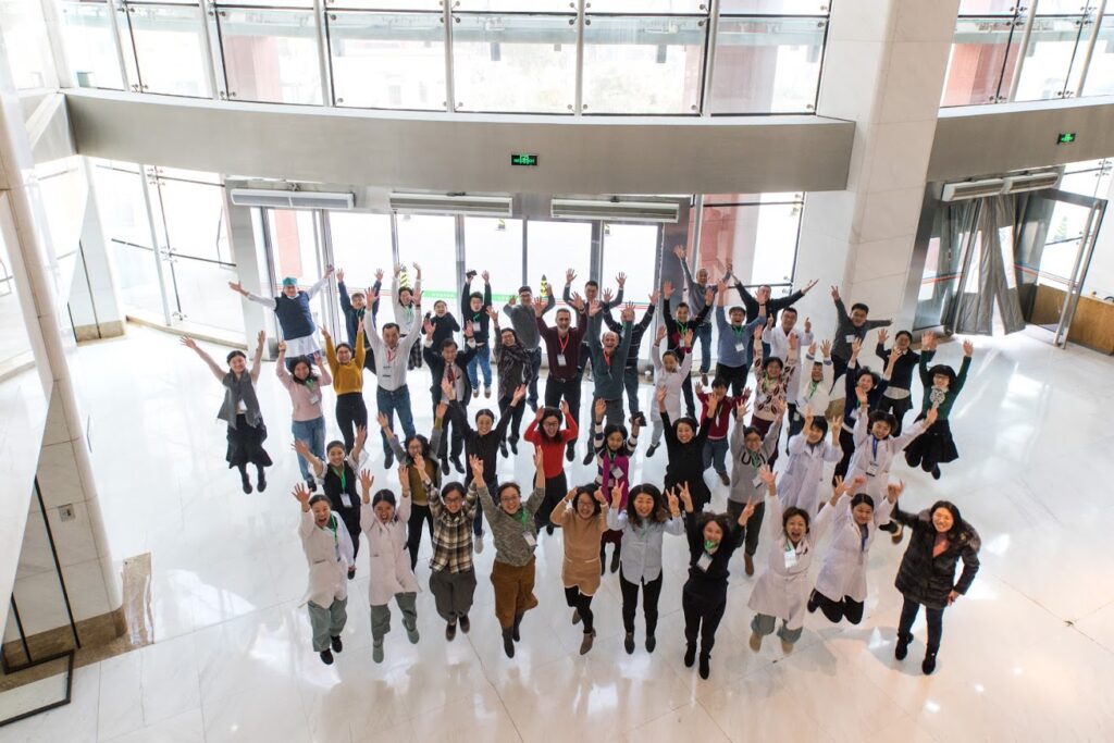 Beijing Friendship Hospital Students celebrate at the conclusion of the workshop