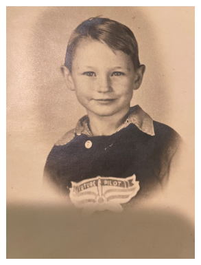 Ed Hammond as a child wearing a future pilot uniform