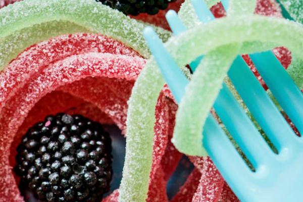 sugar covered candy and blackberries