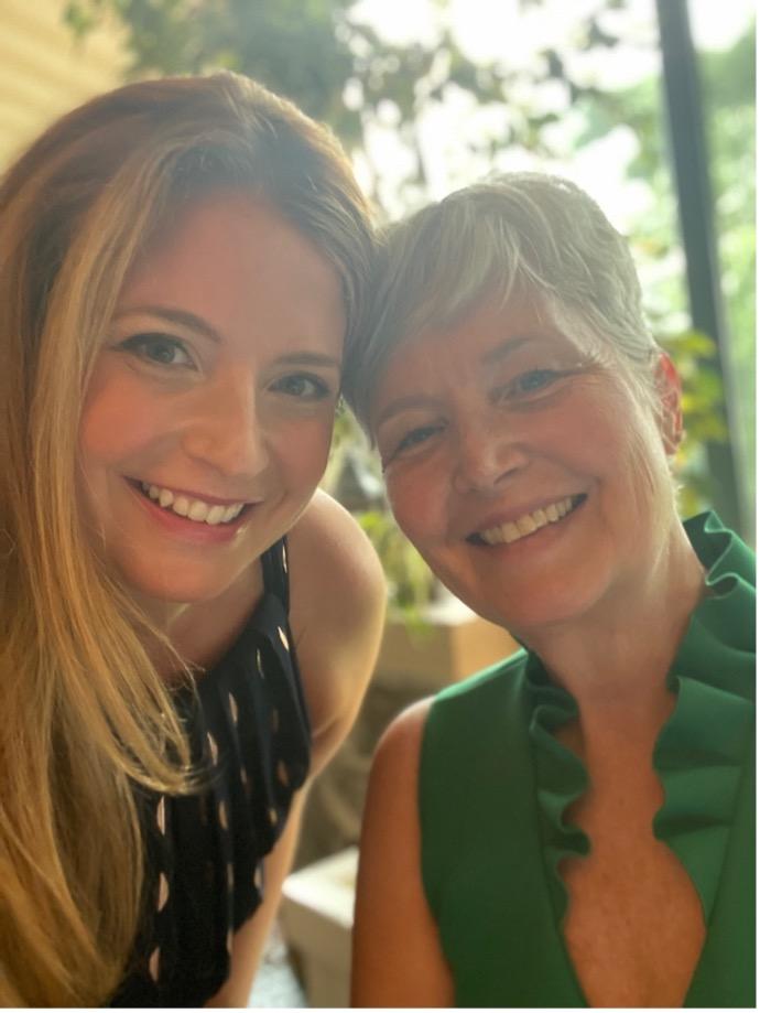 Shannon Clarke posing with another woman