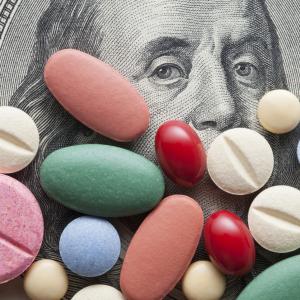 Pills on a $100 bill
